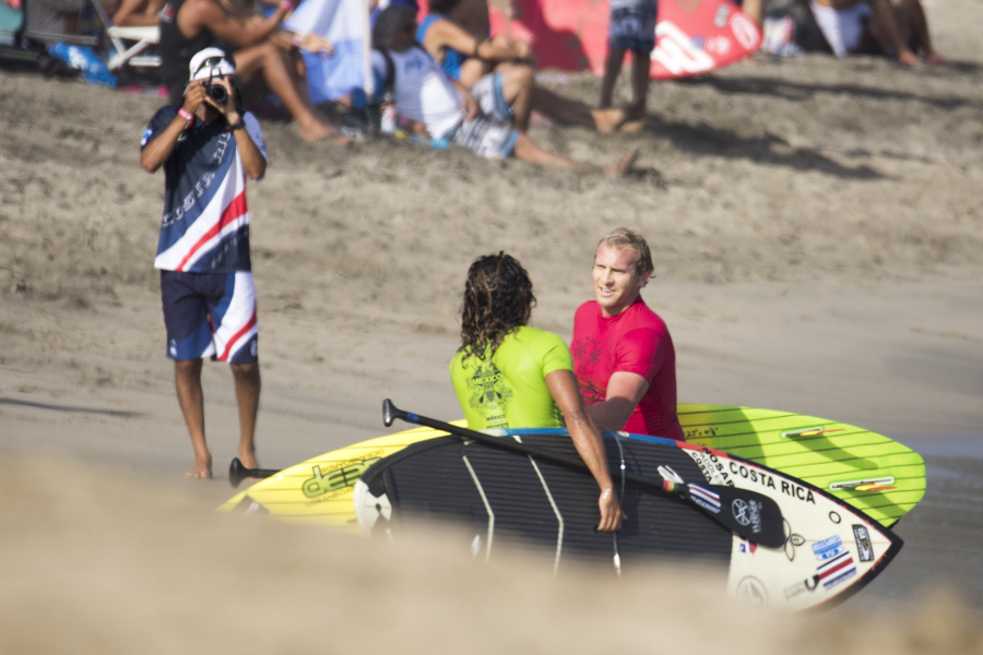 Australia's Jackson Close, shaking hands with Costa Rica's Alvaro Solano, showing the spirt of sportsmanship, a common site at ISA World Championships. Photo: ISA/Ben Reed