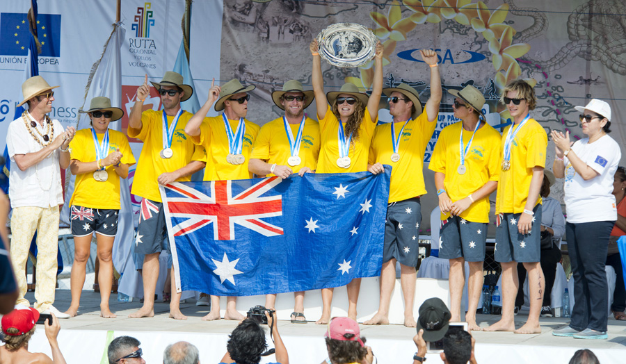 ISA President Fernando Aguerre (far left) and Minister of Tourism Mayra Salinas (far right) present Team Australia with the 2014 ISA SUP and Paddleboard Championship Team Gold Medal and World Team Champion Plate. Photo: ISA/Michael Tweddle