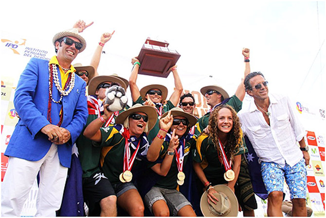 The defending Champions from the inaugural 2012 ISA World SUP and Paddleboard Championship, Team Australia, shown here with ISA President Fernando Aguerre (far left) and Club Waikiki President Jose Osterling (far right) as they lift the Club Waikiki-Peru Team Trophy, will be back this year in full force featuring the defending Champions Jamie Mitchell, Brad Gaul, and Jordan Mercer. Photo: ISA/Marotta
