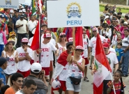 Team Peru at the Parade Of Nations. Credit: ISA/Michael Tweddle